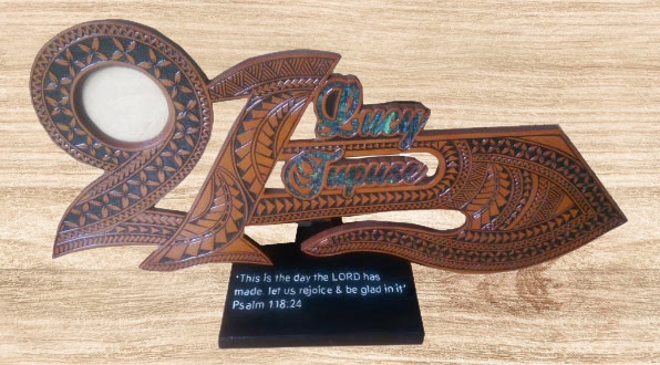 21ST Shaped carving with Island girl designs on a bible verse