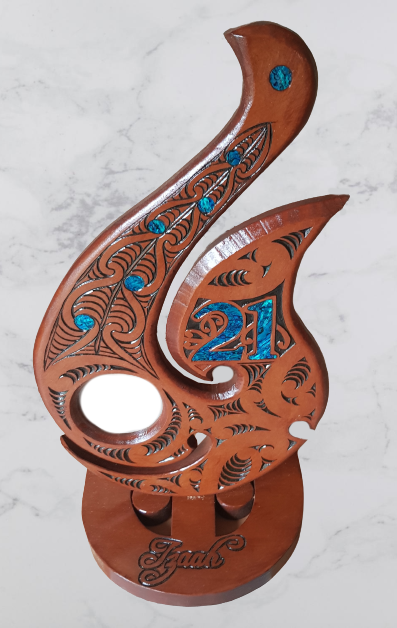 21st Maori Hook with blue paua on stand