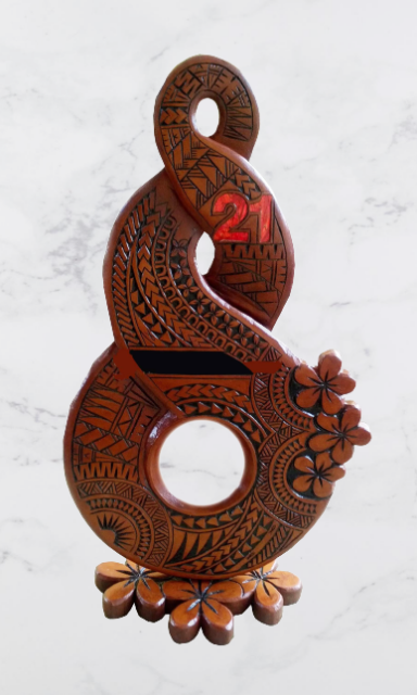 21st Maori Twist with Samoan designs and frangipani cut out on stand