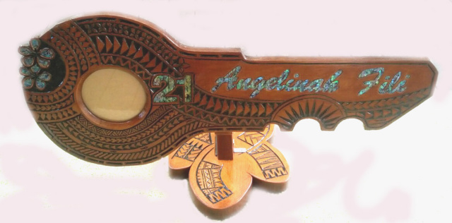 21st Key Samoan Design on a stand 